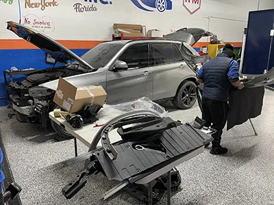 Dynamic Collision - LIC repair shop photo 6