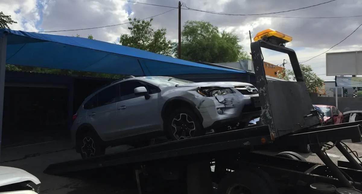 Joe's Collision Repair ( We Can Waive Your Deductible Up to $1200!) repair shop photo 1