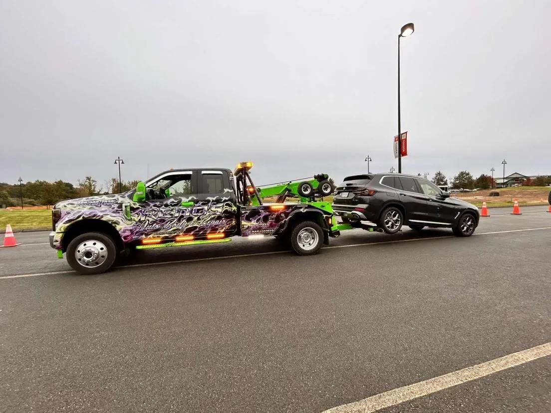 Reno's Auto Body & Repair Inc repair shop photo 5