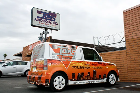Tom's Auto Body, Inc. repair shop photo 2